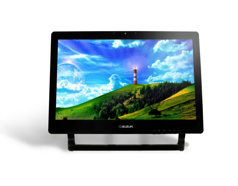 Black Suzuki monitor displaying a colorful wallpaper featuring a lighthouse on a green hill under a blue sky.