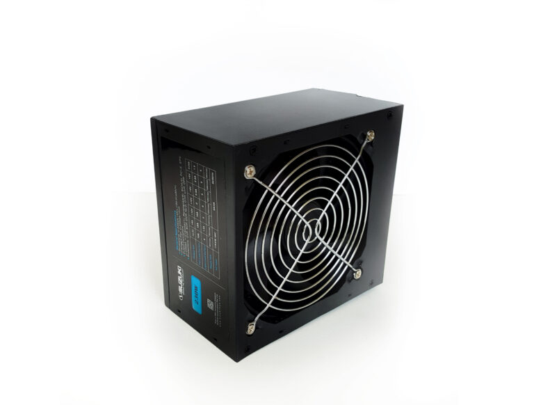 Angled rear view of a black Suzuki 230W ATX power supply showing the cooling fan grill and specification label.