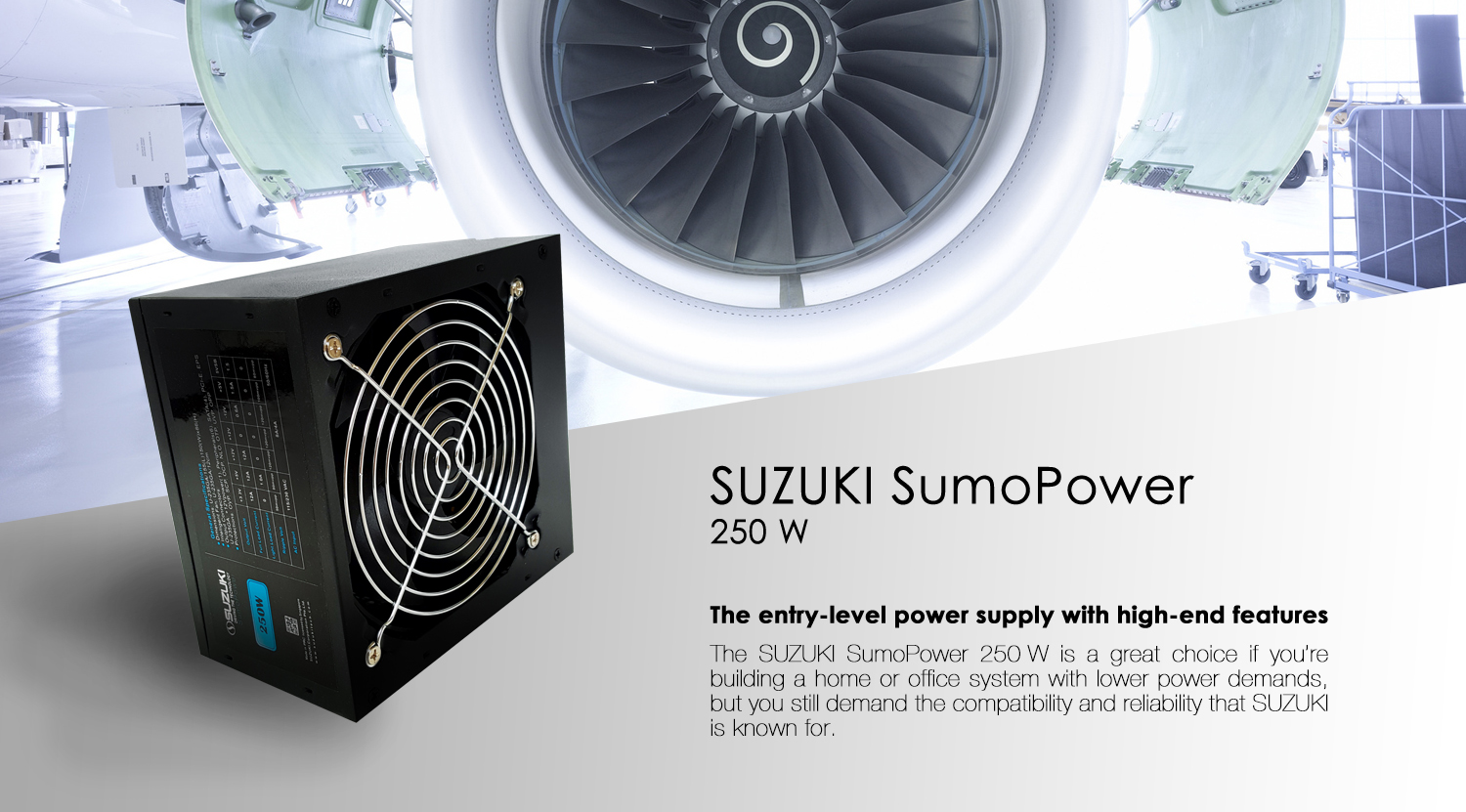 Black Suzuki SumoPower 250 W power supply unit with fan grill set against a blurred background of a jet engine.