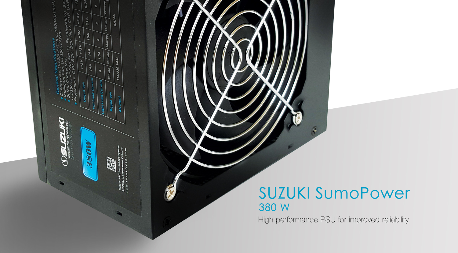 Black Suzuki SumoPower 380W computer power supply unit displaying the rear cooling fan grill and side specification sticker