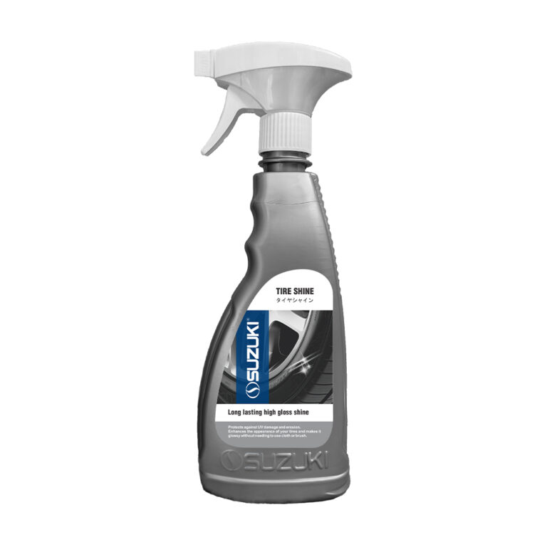 Grey Suzuki Tire Shine spray bottle with a white nozzle, labeled for long lasting high gloss shine and UV protection.