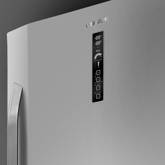 Close-up of the vertical digital control panel and Suzuki logo on a white refrigerator door
