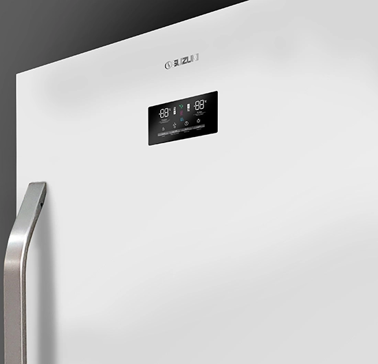 Close-up of a white refrigerator door featuring a black digital display panel and a silver handle.