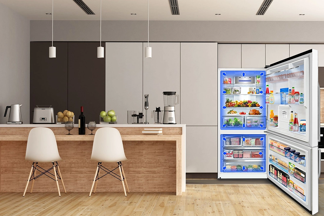 Open white refrigerator in a contemporary kitchen displaying blue arrows that indicate internal cooling airflow circulation.