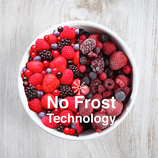White bowl filled with frozen raspberries, blackberries, and blueberries on wood with No Frost Technology text overlay.