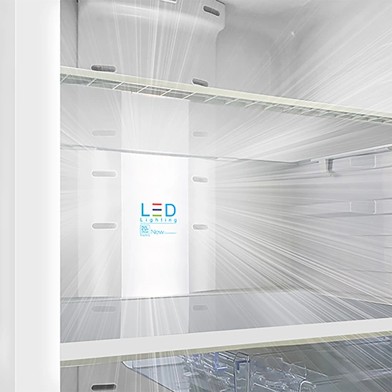 Interior view of a refrigerator with glass shelves illuminated by bright LED lighting rays.