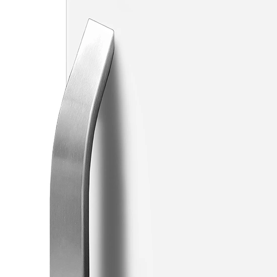 Close-up view of a sleek, curved brushed metal door handle mounted on a white door surface