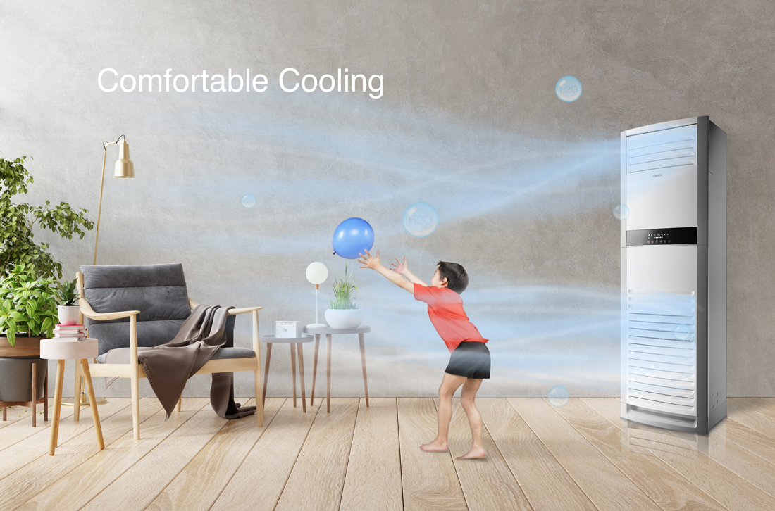 A child playing with a blue balloon in a living room cooled by a sleek tower air conditioner