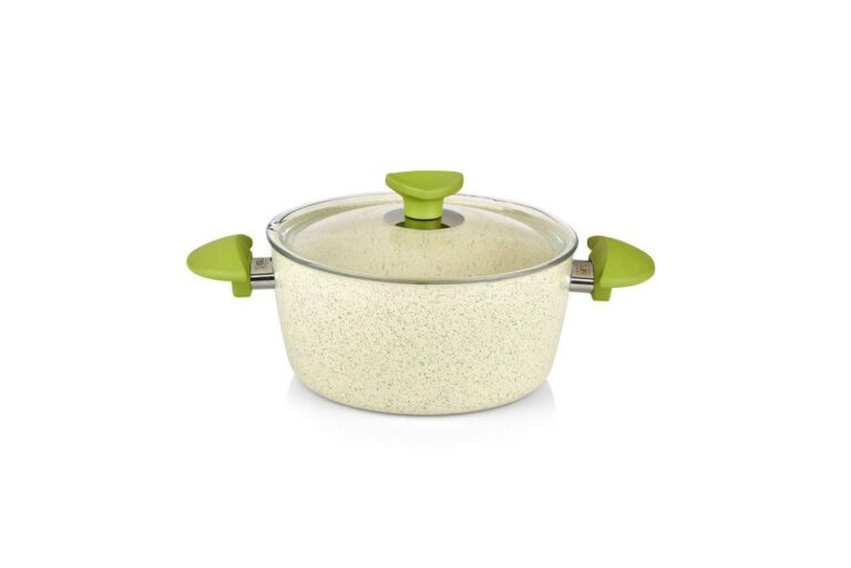 Cream speckled cooking pot with green leaf-shaped handles and a glass lid.